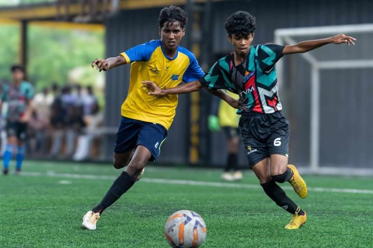 two player chasing for the football